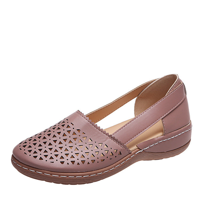 Women's perforated slipper pumps with side cut-outs, elastic heel strap, and cushioning comfort sole Mune Fashion