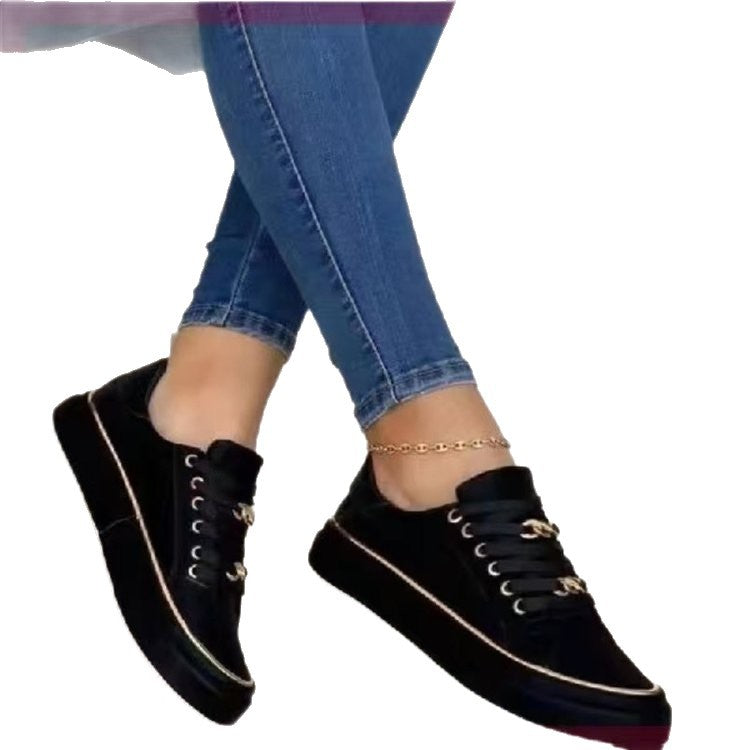 Women's platform sneaker with gold decorative edging and jewelry chain details Mune Fashion