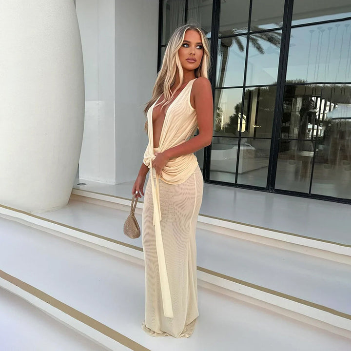 Women's elegant maxi dress with deep V-neckline and seductive wrap details Mune Fashion