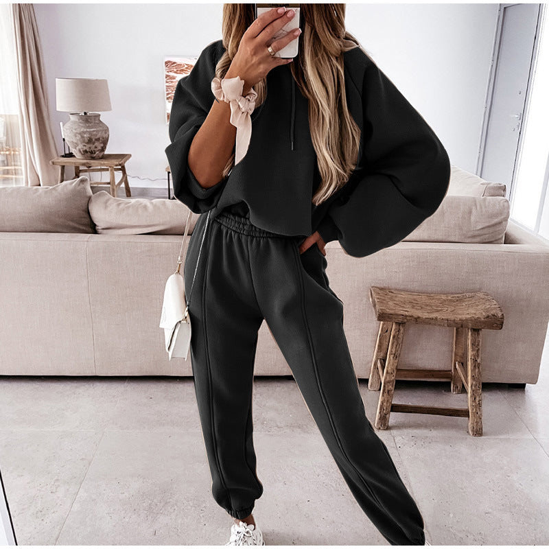 Women cozy lounge two-piece set with oversized hoodie, balloon sleeves, and tailored joggers Mune Fashion