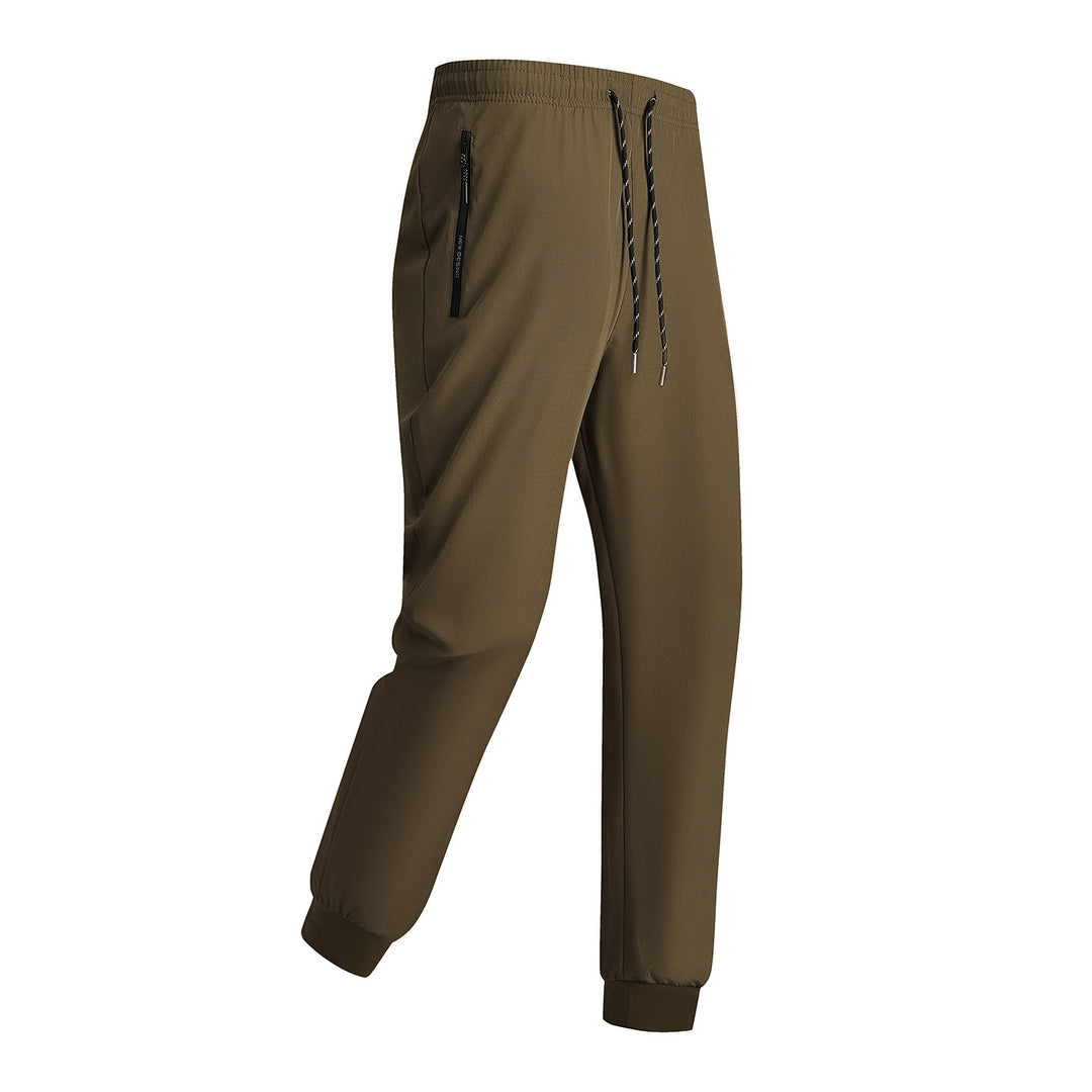 Men's sporty training pants with elastic waistband and zippered pockets Mune Fashion