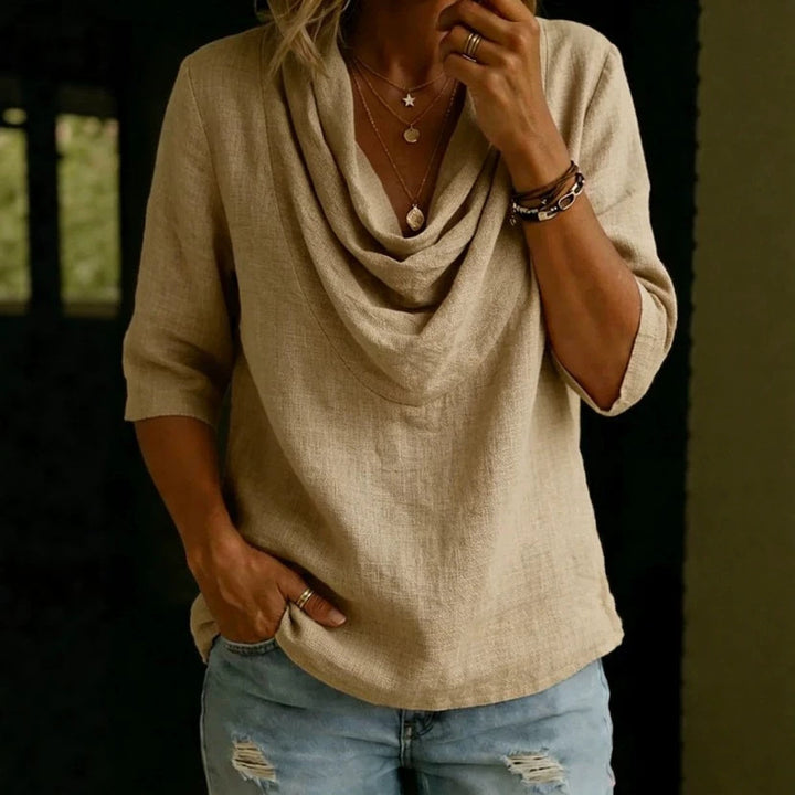Women's airy linen blouse with draped waterfall collar, loose silhouette, and three-quarter sleeves Mune Fashion
