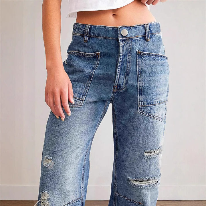 Women's oversized straight-leg jeans with patch cargo pockets and used effects Mune Fashion