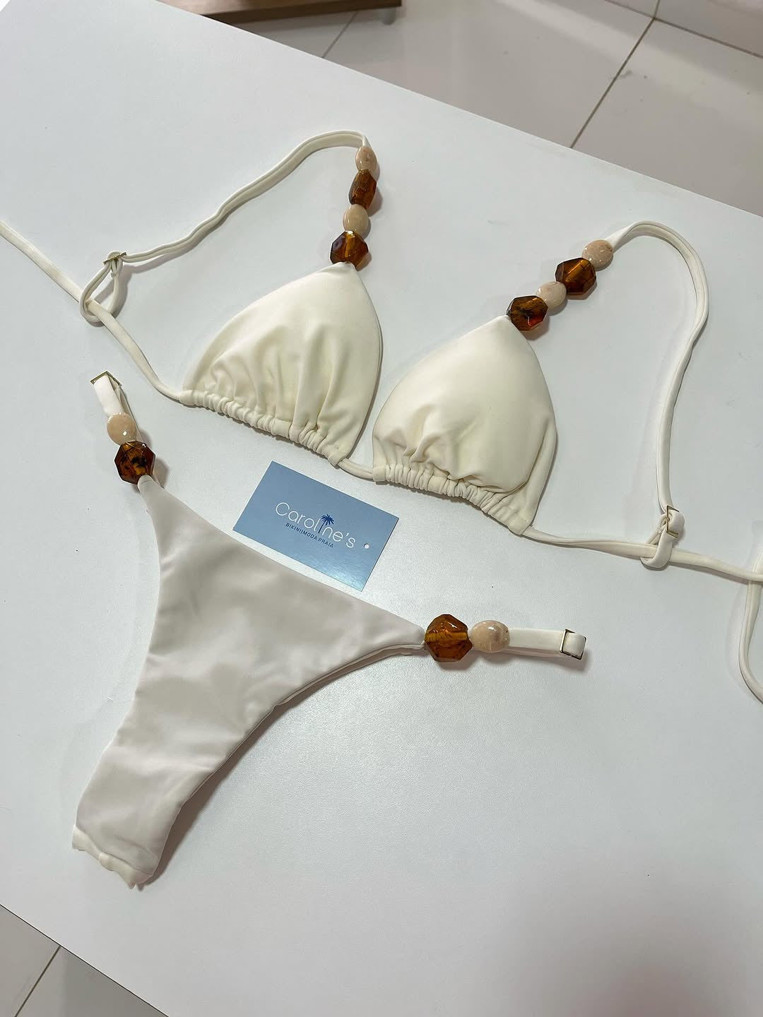Women Triangle Bikini with elastic bands and decorative details Mune Fashion