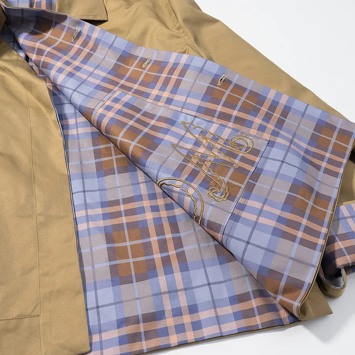 Ladies' casual rain jacket with removable check scarf as collar detail and embroidered patch pocket Mune Fashion