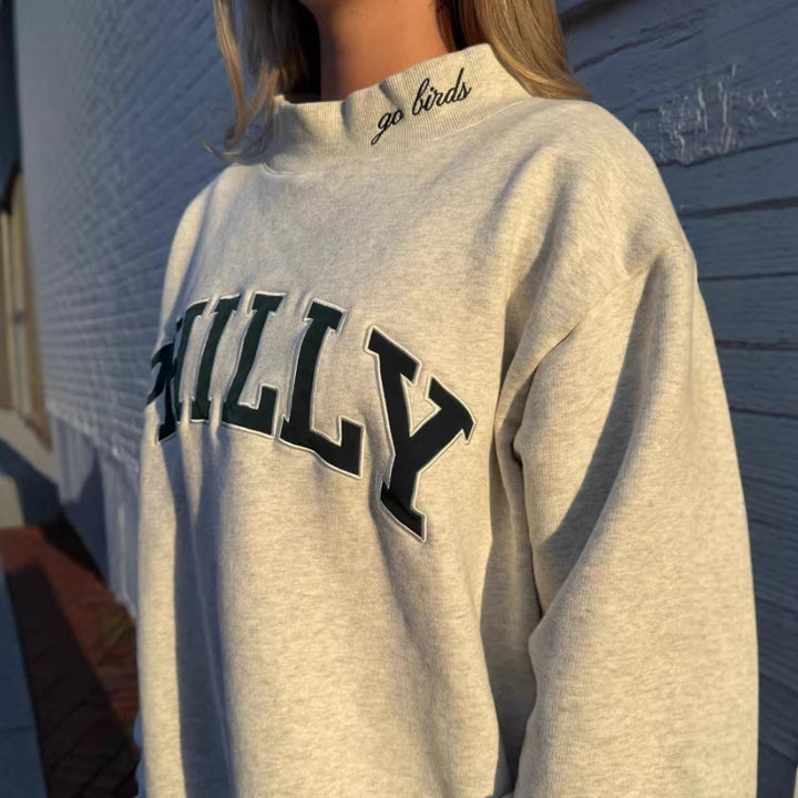 Women's oversized college sweatshirt with high stand-up collar and sewn-on lettering Mune Fashion