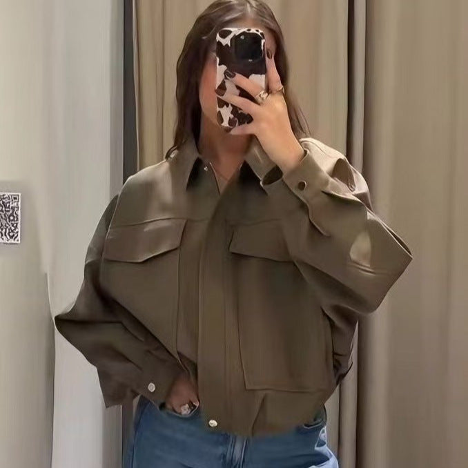 Women's oversized short utility blouson jacket with shirt collar, large patch pockets, and tailored cuffs Mune Fashion