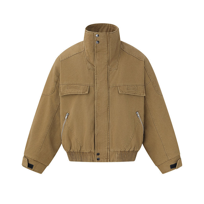 Men's short-cut canvas bomber jacket with high stand-up collar, concealed front placket, and zip pockets Mune Fashion