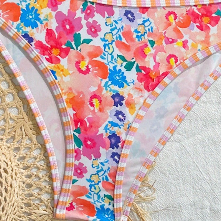 Women's triangle bikini set with floral pattern and playful design Mune Fashion