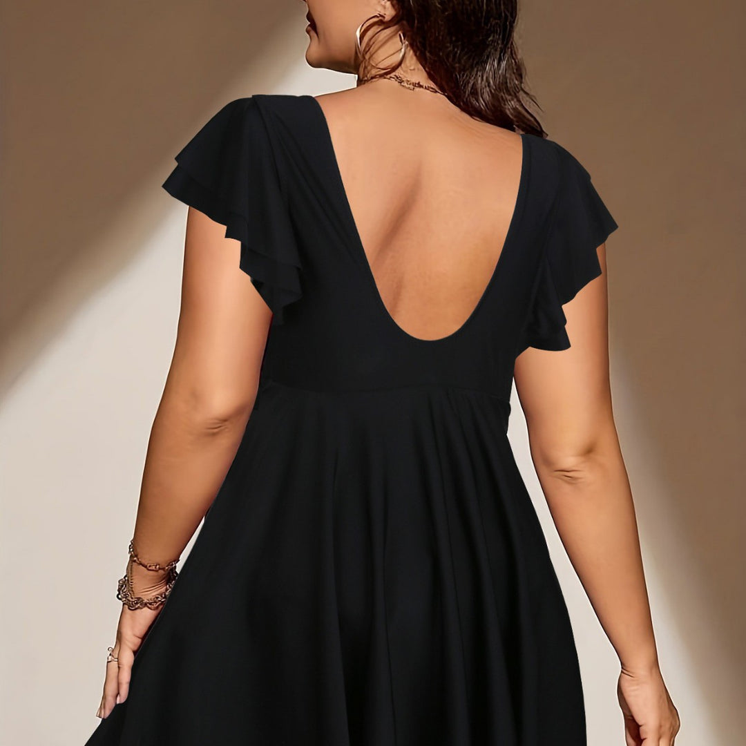 Women's beach dress with a light V-neck and voluminous ruffle details Mune Fashion