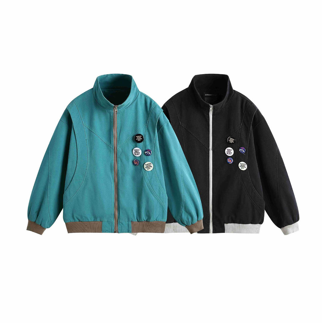 Women's short blouson with stand-up collar, ribbed cuffs and lapel pins Mune Fashion