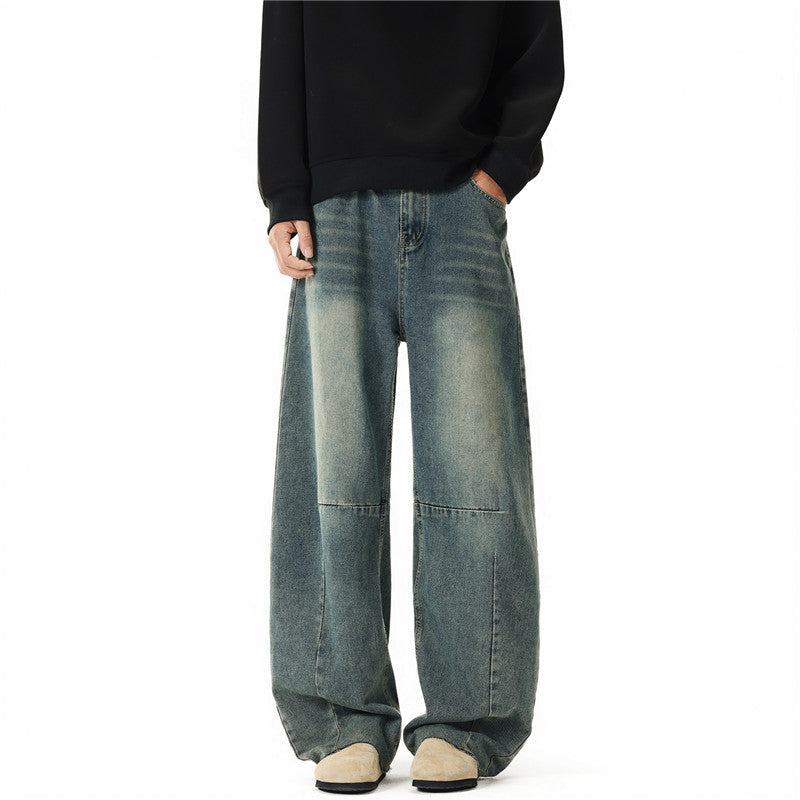 Men's wide-cut baggy jeans with high rise, knee darts, and distressed wash Mune Fashion
