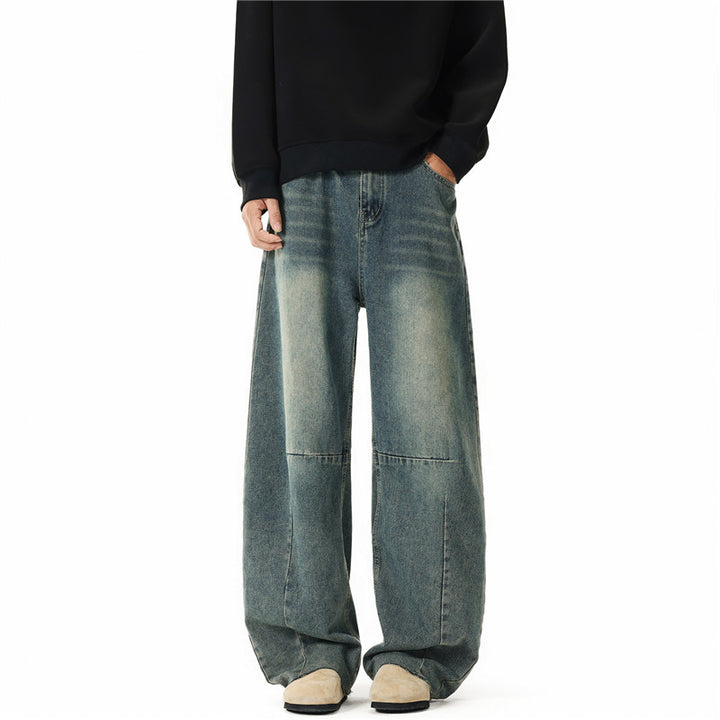 Men's wide-cut baggy jeans with high rise, knee darts, and distressed wash Mune Fashion