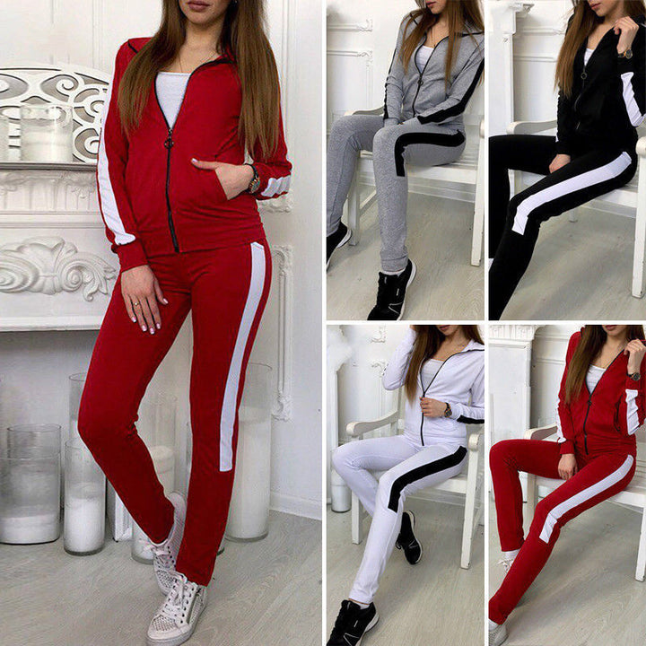 Women's tracksuit made of stretch material with side contrast stripe and zipper Mune Fashion