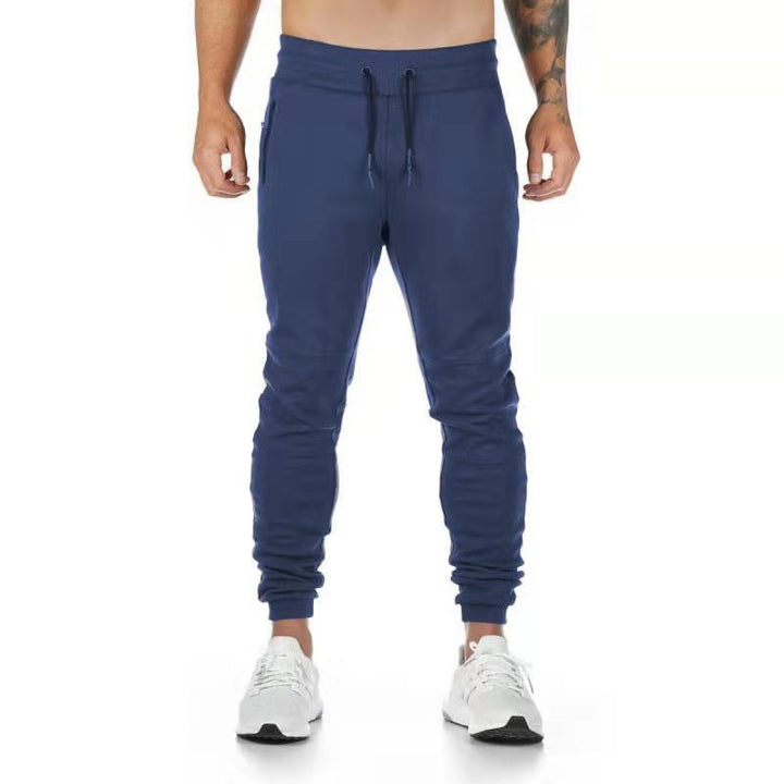 Men's narrow-cut joggers with ribbed waistband, zip pocket, and knee darts Mune Fashion