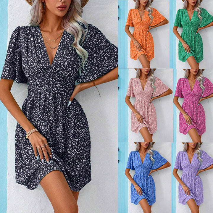 Women's summer dress with V-neck, gathered bust area and wing sleeves Mune Fashion