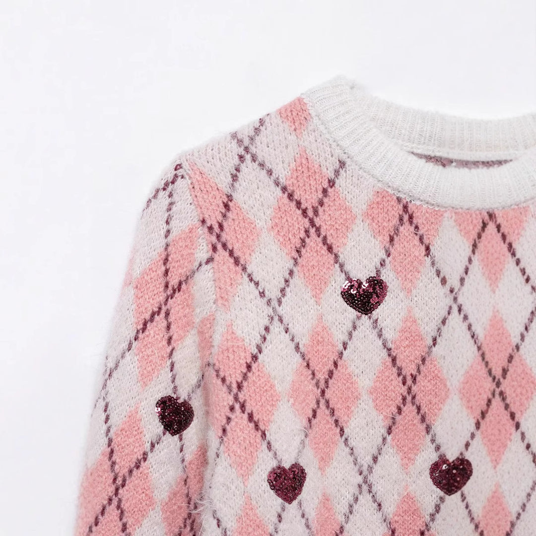 Women's playful argyle knit sweater with sequin hearts and round neckline Mune Fashion
