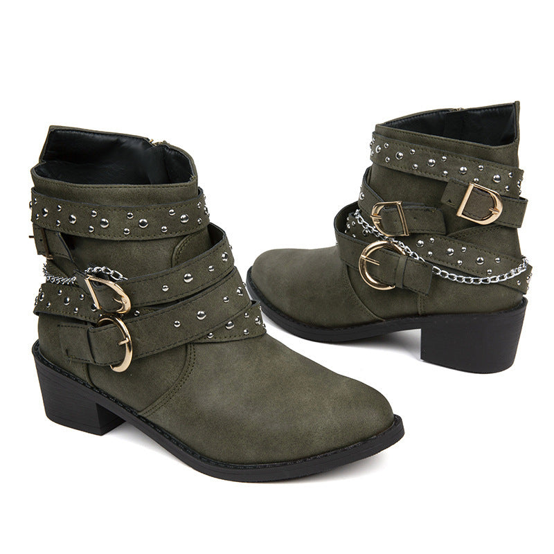 Women's ankle-height biker ankle boots with studded strap, chain and buckle details Mune Fashion