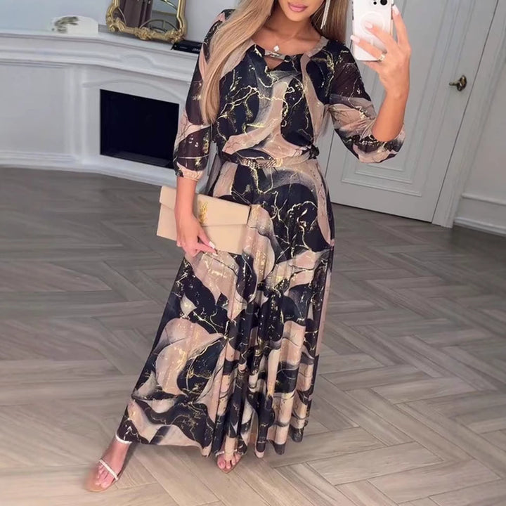 Ladies' maxi dress with abstract marble print, chiffon overlay, keyhole neckline and elastic waist yoke Mune Fashion
