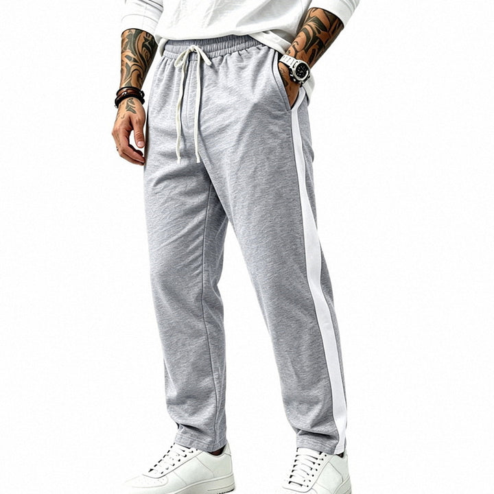 Men's jogging pants with side contrast stripes, elastic waistband, and drawstring Mune Fashion