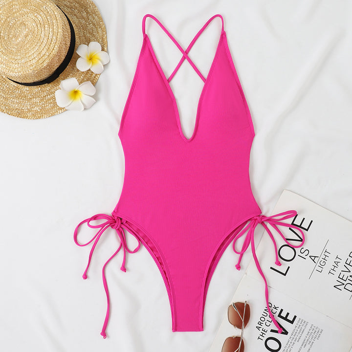 Ladies one-piece swimsuit with deep V-neck and adjustable side ties Mune Fashion