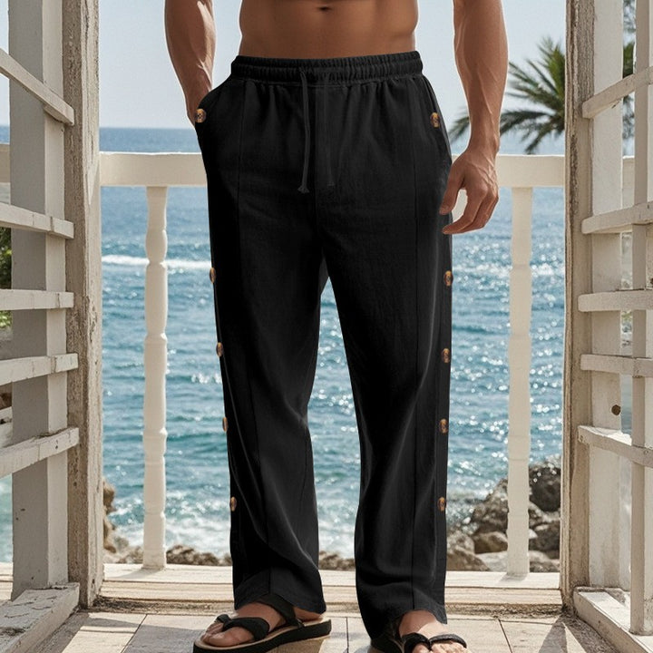 Men's wide beach pants with side snap-button opening, elastic drawstring, and airy linen blend Mune Fashion