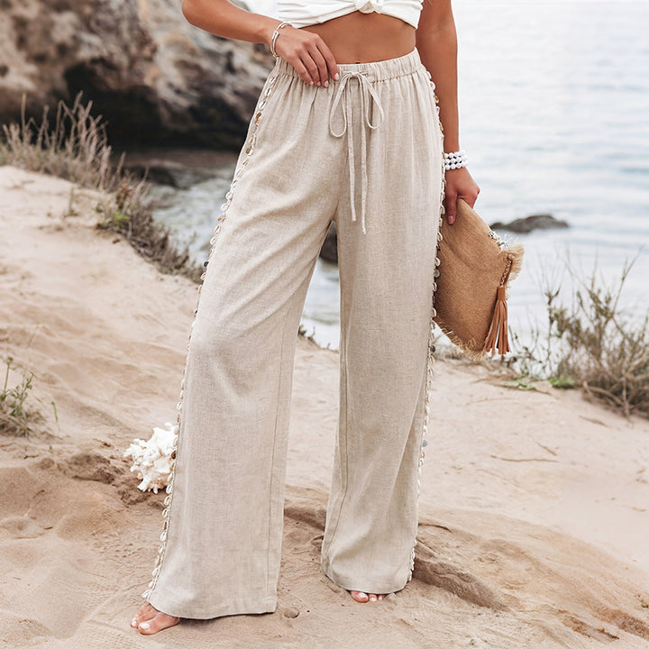 Women’s lightweight linen pants with wide leg, drawstring and braided side detail Mune Fashion