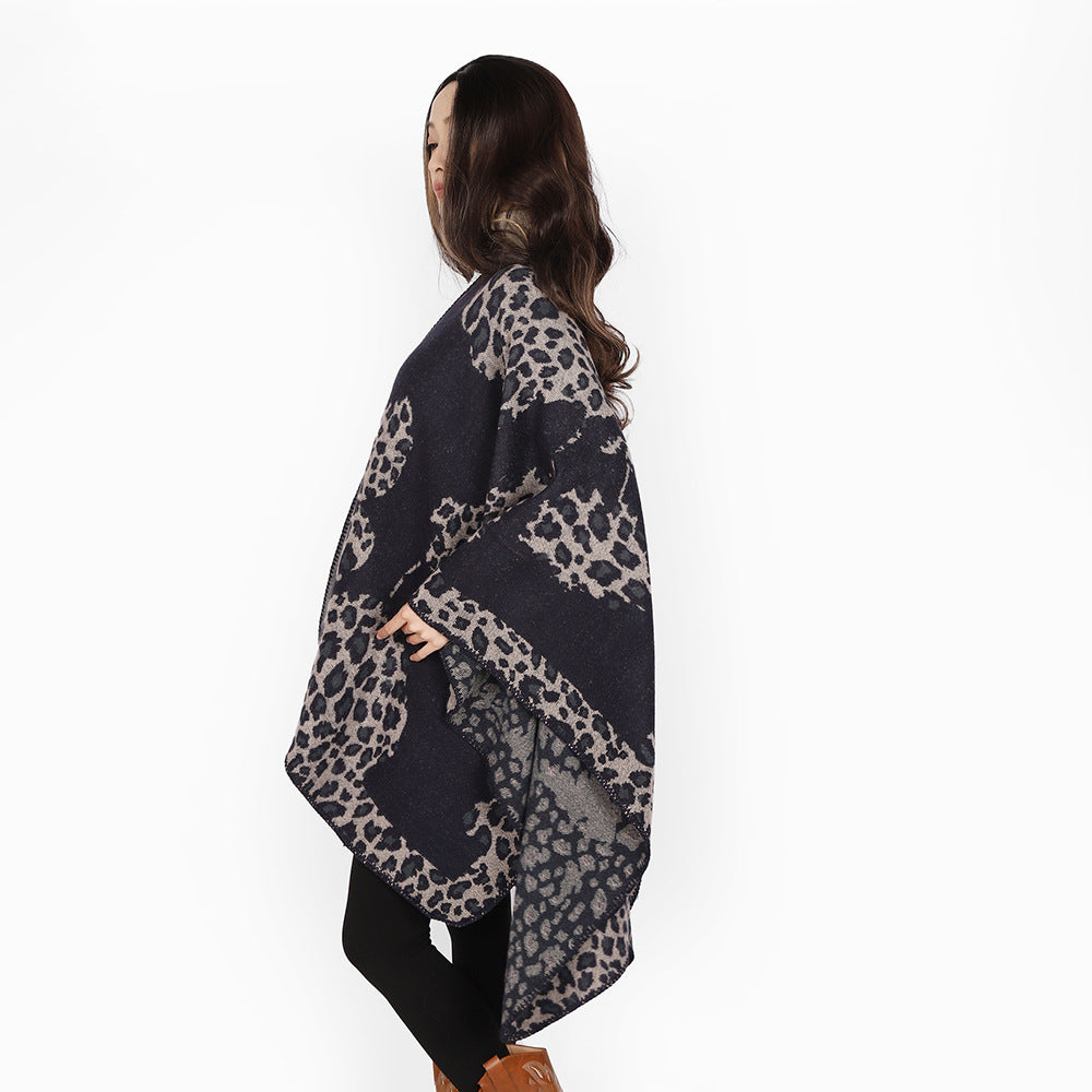 Women's wool look throw with woven leopard jacquard and open pointed edge Mune Fashion