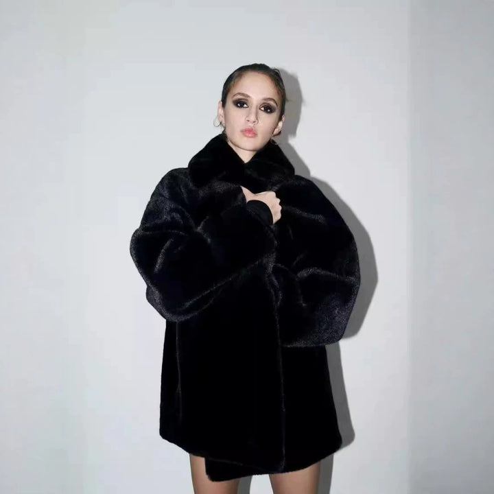 Women's boxy short coat made of silky shiny high-pile artificial fur with a large shawl collar Mune Fashion