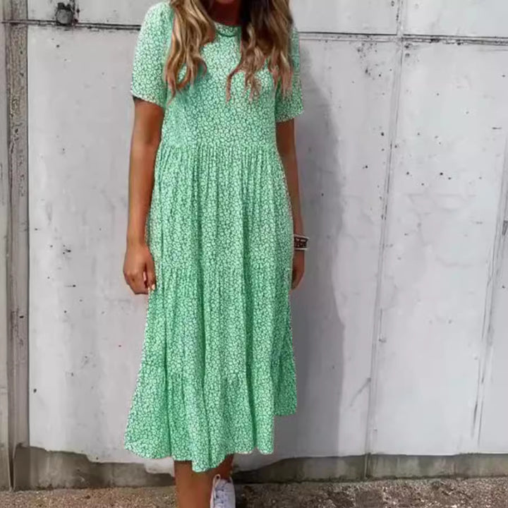 Women's floral crinkled midi dress with gathered empire waist, short sleeves, and tiered ruffle skirt Mune Fashion