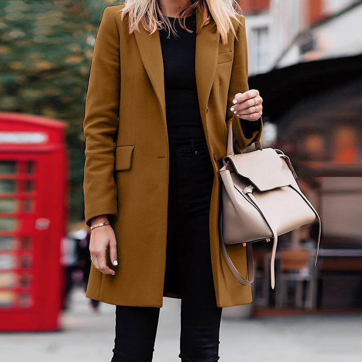 Women's tailored wool blend coat with a slim fit, lapel collar and concealed button placket Mune Fashion