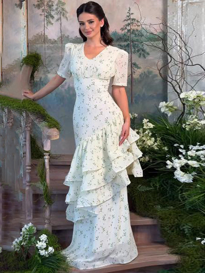 Women’s maxi dress in vintage-romantic style with asymmetric ruffles and puff sleeves Mune Fashion