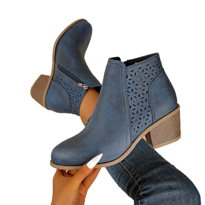 Women's ankle-high ankle boots with laser-cut perforation, side zipper, and mid-high block heel Mune Fashion