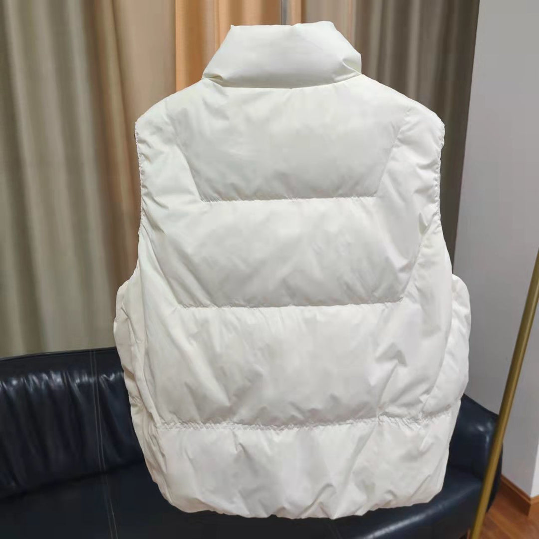 Women's quilted thermal vest with high stand-up collar and patch flap pockets Mune Fashion