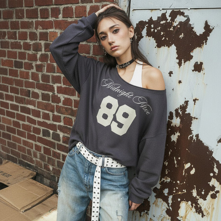 Women's oversized sweatshirt in off-shoulder style with vintage front print and flared hem Mune Fashion