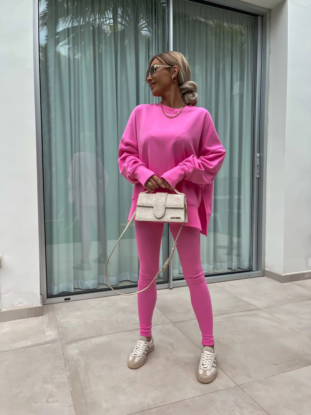 Women comfortable oversized lounge set with long sweatshirt, ribbed high-waist leggings and extended cuffs Mune Fashion