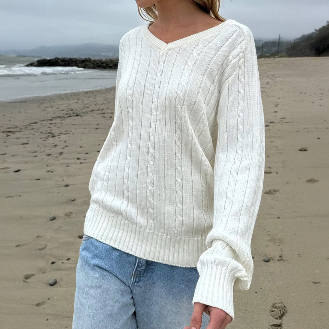 Women's fine textured knit sweater with V-neck, cable pattern and ribbed hem Mune Fashion