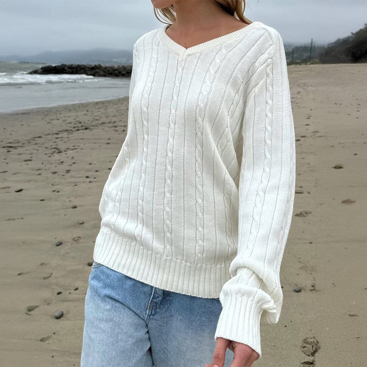 Women's fine textured knit sweater with V-neck, cable pattern and ribbed hem Mune Fashion