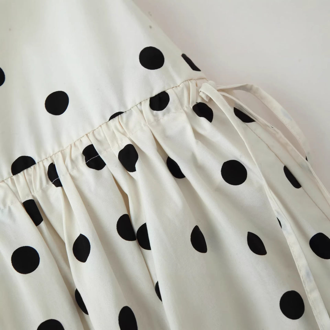 Women's tiered skirt made of lightweight viscose with polka dot print and asymmetrical pointed hem Mune Fashion
