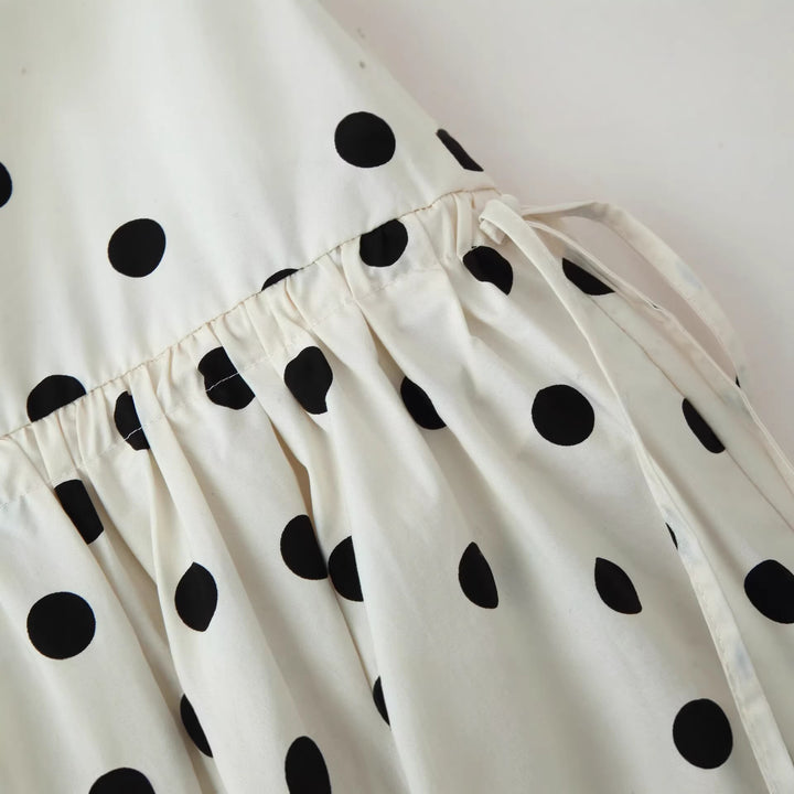 Women's tiered skirt made of lightweight viscose with polka dot print and asymmetrical pointed hem Mune Fashion
