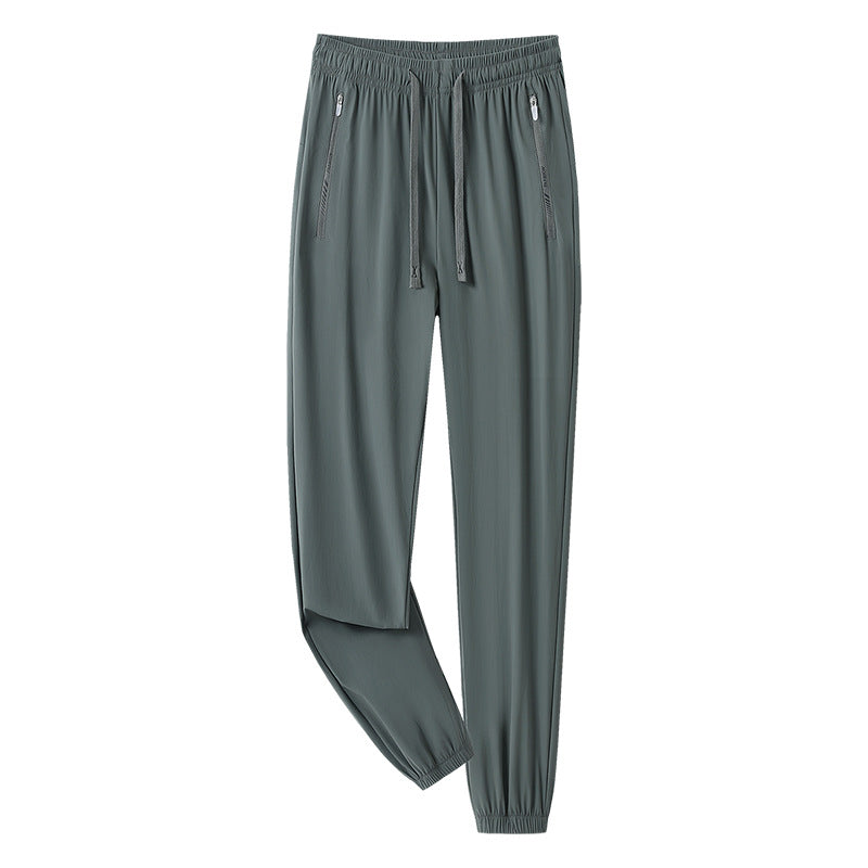 Men's sporty jogging pants with adjustable waistband and zippered pockets Mune Fashion