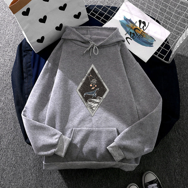 Women's oversized hoodie with sewn whale patch application, kangaroo pocket, and fleece-lined interior Mune Fashion