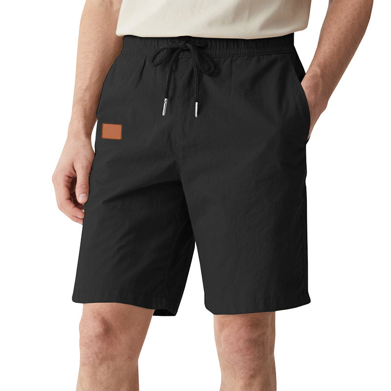 Men's quick-drying swim shorts in Bermuda cut with elastic waistband and drawstring Mune Fashion