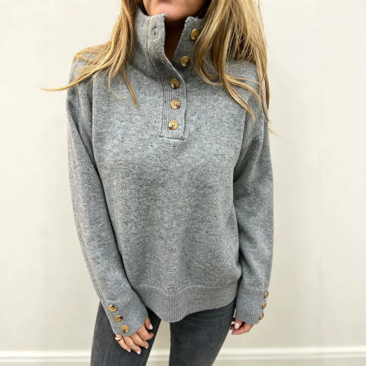 Women's knit sweater with high button collar, decorative front placket and decorative buttons Mune Fashion