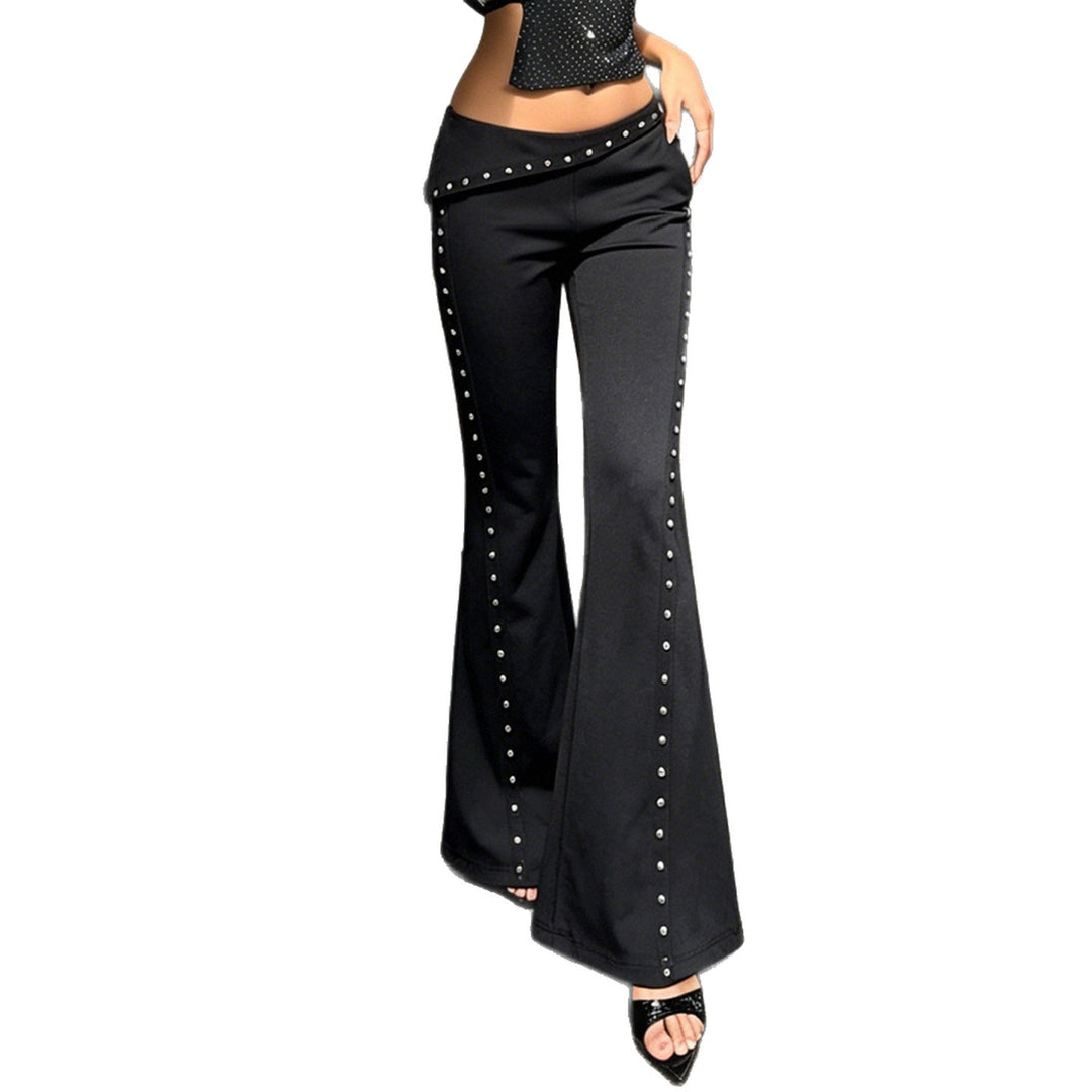Women's flared pants with asymmetrical folded waistband and metal studs along the side seam Mune Fashion