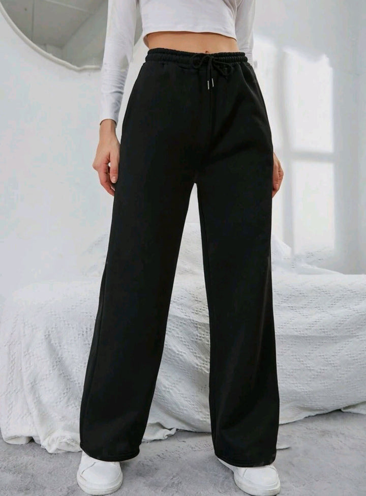 Women's High-Waist Wide-Leg Jogging Pants with elastic comfort waistband, drawstring, and deep side pockets Mune Fashion