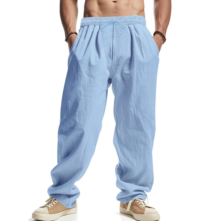 Men's loose leisure pants with elastic waistband, drawstring, and deep side pockets Mune Fashion