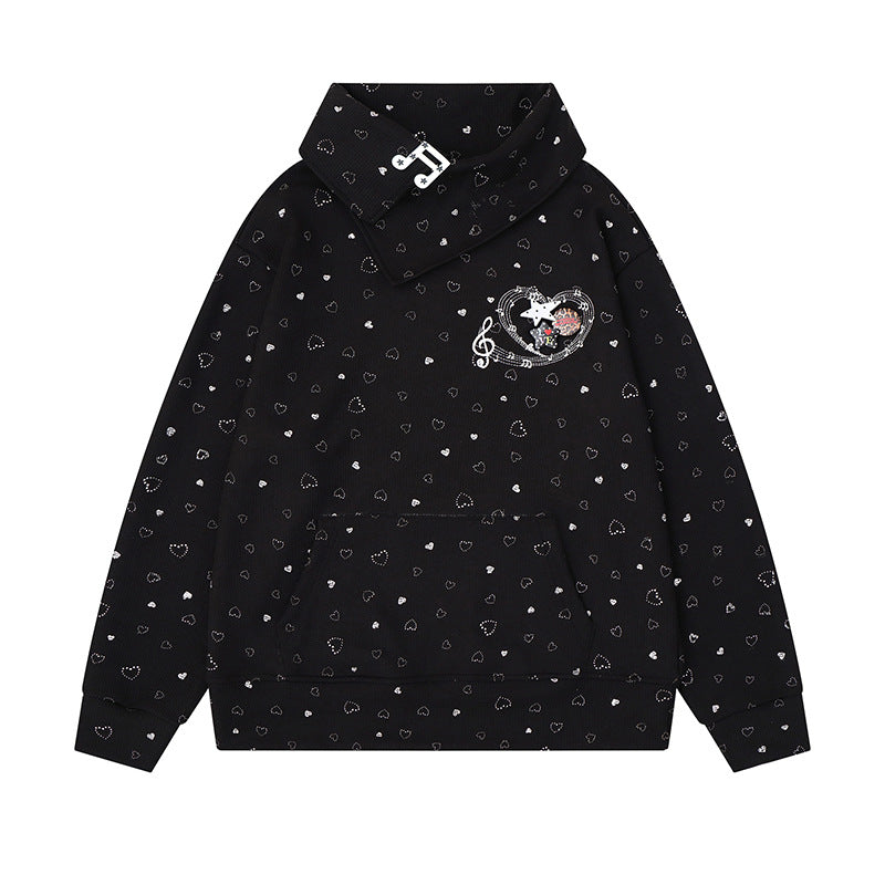 Women’s oversized sweatshirt with asymmetrical stand-up collar, kangaroo pocket and musical heart embroidery Mune Fashion