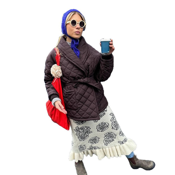 Women's wrap quilted jacket with tie belt at the waist and shawl collar Mune Fashion