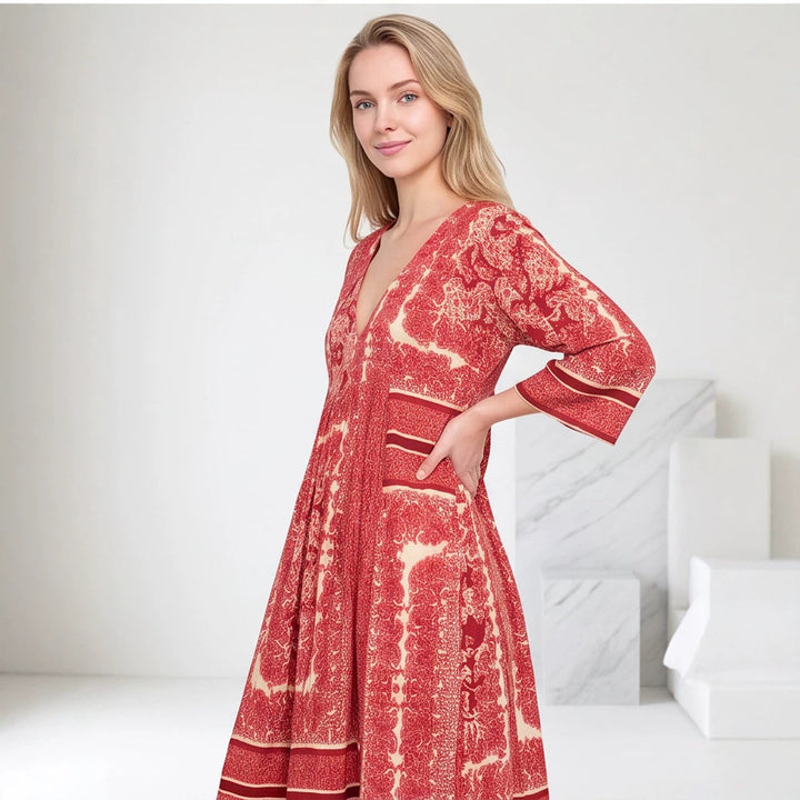 Women’s V neck midi dress with three-quarter sleeves, side pockets & flared A-line silhouette Mune Fashion